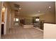 Second story landing features neutral carpet, black railing, and access to other rooms at 10511 Loma Portal Ave, Las Vegas, NV 89166
