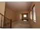 Spacious living room featuring carpet, hardwood floors, and natural lighting at 10511 Loma Portal Ave, Las Vegas, NV 89166