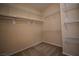 Spacious walk-in closet offers ample storage with built-in shelving at 10511 Loma Portal Ave, Las Vegas, NV 89166