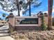 Beautiful Emerald Valley community sign with lush plants and decorative rocks at 1323 Winter Solstice Ave, Henderson, NV 89014