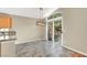 Dining room with tiled floors and sliding door at 1323 Winter Solstice Ave, Henderson, NV 89014