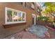 Spacious outdoor patio with tiled floor at 1405 San Juan Hills Dr # 104, Las Vegas, NV 89134
