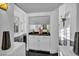 Bar area showcasing sleek cabinetry, white walls, and a clean design at 174 Buena Ct, Henderson, NV 89074