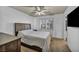 Calm bedroom with window seating, neutral carpet, and a large dresser at 174 Buena Ct, Henderson, NV 89074