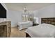 Bright bedroom featuring two beds, neutral carpet, and a dresser at 174 Buena Ct, Henderson, NV 89074