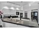 The kitchen offers granite countertops, modern appliances, and bright lighting at 174 Buena Ct, Henderson, NV 89074