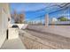 An enclosed backyard featuring desert landscaping and a built-in BBQ at 2517 New Salem Ave, Henderson, NV 89052