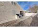 An enclosed backyard featuring desert landscaping and a built-in BBQ at 2517 New Salem Ave, Henderson, NV 89052