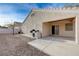 An enclosed backyard featuring desert landscaping and a built-in BBQ at 2517 New Salem Ave, Henderson, NV 89052