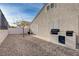 An enclosed backyard featuring desert landscaping and a built-in BBQ at 2517 New Salem Ave, Henderson, NV 89052