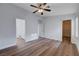 Bedroom featuring hardwood floors, ensuite bathroom and walk-in closet at 2517 New Salem Ave, Henderson, NV 89052