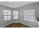 Bright breakfast nook featuring several windows and wood-look flooring at 2517 New Salem Ave, Henderson, NV 89052