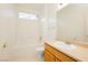 Clean bathroom featuring a shower over tub and vanity with sink at 2856 Sapphire Desert Dr, Henderson, NV 89052