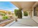 Inviting covered patio with view of the landscaped backyard at 2856 Sapphire Desert Dr, Henderson, NV 89052