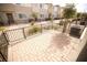Brick patio with modern iron railing for home's backyard at 2946 Plum Torte St, Las Vegas, NV 89122
