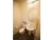 Cozy powder room with a pedestal sink, oval mirror, and modern fixtures at 2946 Plum Torte St, Las Vegas, NV 89122