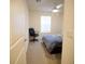 Comfortable bedroom featuring a ceiling fan and a large window at 2946 Plum Torte St, Las Vegas, NV 89122