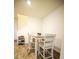 Bright dining area featuring a four-chair table and shoe storage at 2946 Plum Torte St, Las Vegas, NV 89122