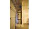 Garage featuring the water heater with the garage door in view at 2946 Plum Torte St, Las Vegas, NV 89122