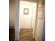 Hallway with wood flooring and white walls and trim at 2946 Plum Torte St, Las Vegas, NV 89122