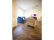 Bright living space featuring a comfortable blue sofa and contemporary decor at 2946 Plum Torte St, Las Vegas, NV 89122