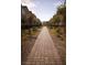 Brick paved walkway lined with trees between residential buildings at 2946 Plum Torte St, Las Vegas, NV 89122