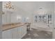 Spa-like main bathroom with a soaking tub, dual vanities, and elegant fixtures at 3141 E Katie Ave, Las Vegas, NV 89121