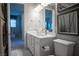 Contemporary bathroom with a double sink vanity, sleek fixtures, and ample lighting for a luxurious feel at 343 Cadence Vista Dr, Henderson, NV 89011