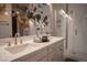 Modern bathroom with double vanity and walk-in shower at 343 Cadence Vista Dr, Henderson, NV 89011
