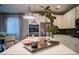 Well-lit kitchen with sleek appliances, a center island with seating, and ample cabinet space for organized storage at 343 Cadence Vista Dr, Henderson, NV 89011