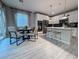 Open floor plan showcasing the kitchen, dining area, and contemporary design elements at 343 Cadence Vista Dr, Henderson, NV 89011