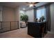 Bright, carpeted office space with ceiling fan and chair at 343 Cadence Vista Dr, Henderson, NV 89011