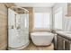 Bathroom features a luxurious shower, and a freestanding tub for ultimate relaxation at 4650 Wonderful St, Las Vegas, NV 89147