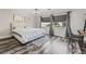 Bedroom with stylish desk, and a large window, combining comfort and functionality at 4650 Wonderful St, Las Vegas, NV 89147