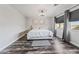 Bedroom with stylish desk, and a large window, combining comfort and functionality at 4650 Wonderful St, Las Vegas, NV 89147