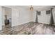 An empty bedroom with wood-look flooring and natural light at 4650 Wonderful St, Las Vegas, NV 89147