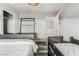 Bedroom with two beds, closet, and wood-look floors provides cozy accommodation at 4650 Wonderful St, Las Vegas, NV 89147