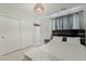 Comfortable bedroom featuring a full closet, bed and modern lighting at 4650 Wonderful St, Las Vegas, NV 89147
