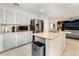 A kitchen island featuring granite countertop and stainless steel appliances at 4650 Wonderful St, Las Vegas, NV 89147