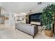 Modern living room features a large TV, comfortable seating, and stylish decor at 4650 Wonderful St, Las Vegas, NV 89147