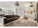 Spacious living room that features an open floor plan and flows into the kitchen at 4650 Wonderful St, Las Vegas, NV 89147