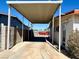 Covered carport providing ample space for parking vehicles and storage at 4964 Dunkirk Ave, Las Vegas, NV 89121