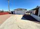 Detached garage with a shed in the backyard, perfect for storage or workshop at 4964 Dunkirk Ave, Las Vegas, NV 89121