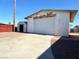Backyard featuring a detached garage and shed, ideal for extra storage space at 4964 Dunkirk Ave, Las Vegas, NV 89121