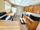 Kitchen featuring an electric range, window with natural light and ample counter space at 4964 Dunkirk Ave, Las Vegas, NV 89121