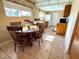 Cozy kitchen featuring a breakfast nook, ample counter space, and natural light at 4964 Dunkirk Ave, Las Vegas, NV 89121