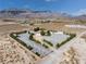Aerial view of the home showing the large lot, surrounding desert landscape, and privacy at 5090 N David St, Pahrump, NV 89060