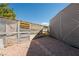 Backyard with a dog run and chicken coop at 5090 N David St, Pahrump, NV 89060