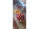 Close-up of a countertop with several bowls of fruit at 5090 N David St, Pahrump, NV 89060