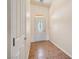 Entryway with decorative front door features ceramic tile flooring and neutral paint at 5090 N David St, Pahrump, NV 89060